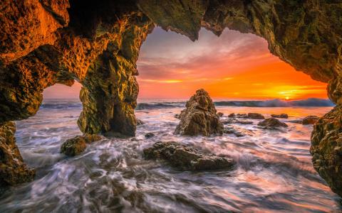 日落时的海洋洞穴全高清壁纸和背景