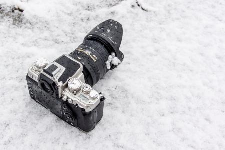 尼康相机在雪4k超高清壁纸和背景图像